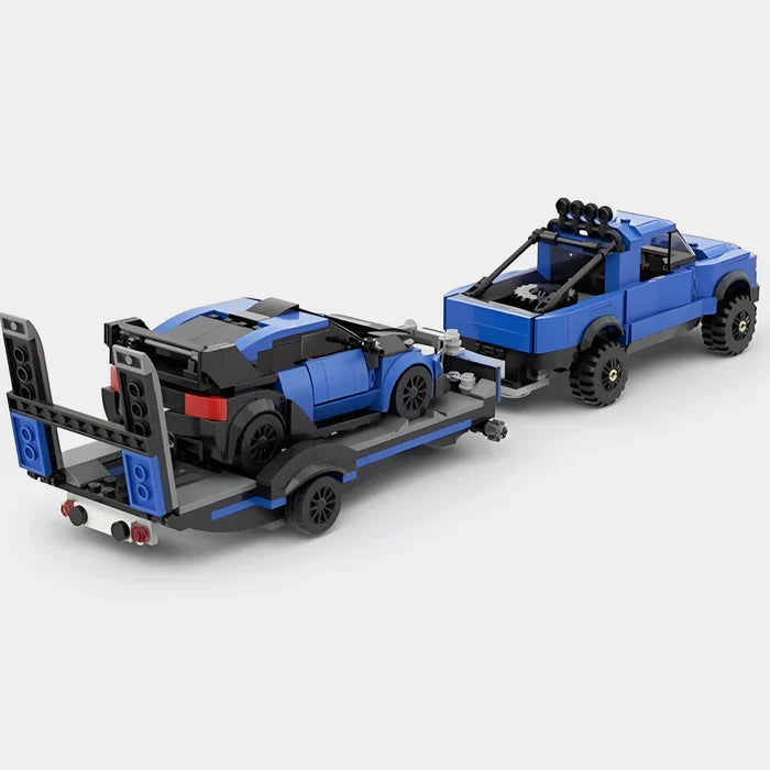 Ford F-150 Raptor with Trailer and Ford Focus Brick Boost