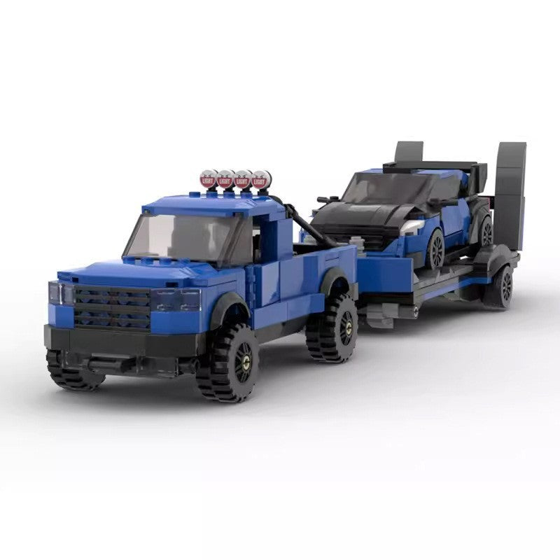 Ford F-150 Raptor with Trailer and Ford Focus Brick Boost